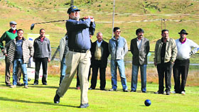 A golfer in action during the second day of the Greater Kashmir Autumn Golf Festival at Gulmarg golf course in Srinagar on Saturday.