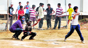 A baseball match in progress during the 4th Junior Ludhiana District Baseball Championship at Guru Nanak Khalsa College, Model Town, in Ludhiana on Saturday.