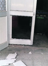 The broken door of an office at the Model Gram railway station in Ludhiana.
