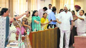 Councillors argue during a meeting of the municipal corporation