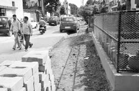 Work on laying paver blocks has been left midway by the municipal corporation at Phase I in Mohali