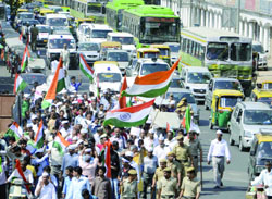 Traffic moved slowly at Connaught Place as the activists of the India Against Corruption (IAC) protest on Sunday, demanding the resignation of Law Minister Salman Khurshid.