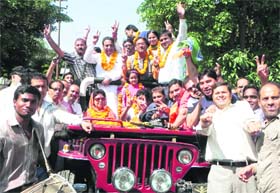 Mala Raj Lakshmi Shah, along with other BJP leaders, during a victory procession in Dehradun on Sunday