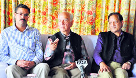 BJP national vice-president Shanta Kumar (centre) addresses a press conference in Dharamsala on Sunday.