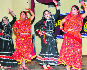 Students perform during the folk dance competition at University of Jammu on Sunday.