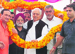 PDP patron Mufti Mohammad Sayeed being felicitated at a public meeting at Ramgarh in Samba district on Sunday. 