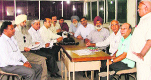 Members of the Ludhiana Philately Club gather on Philately Day at the Head Post Office in Ludhiana. 
