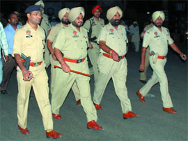 New Bathinda SSP Ravcharan Singh Brar leads a flag march carried out across Bathinda city on Monday evening.