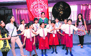  The inmates of Lalita Vidya Niketan, Gannaur, perform a group song before the members of the Rotract Club, Geeta Vidya Mandir Girls College, Sonepat, during the celebration of Joys of Giving Week. 