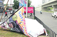 Hoardings that got uprooted at BMC Chowk due to strong winds in Jalandhar on Monday. A number of hoardings have been illegally fixed in almost every part of the city. 
