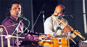 Dhamesh Nargotra sings a ghazal at the Mehfil-e-Ghazal at Government Polytechnic College in Jammu on Monday.