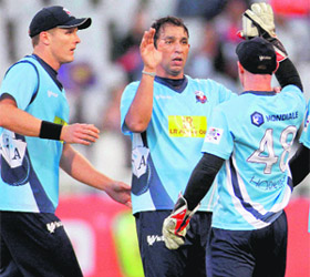 Azhar Mahmood celebrates the fall of Brendon Mc Cullums wicket on Monday. 