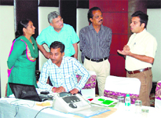 Officials of the Wool Research Academy, Mumbai, interact with local industrialists in Amritsar.