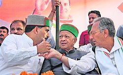 Kewal Singh Pathania, Virbhadra Singh and Vijai Singh Mankotia at a rally in Shahpur on Tuesday
