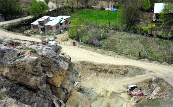 A file photograph of mining work in progress near the ancient Abhinavgupt caves in the Beerwah area in Budgam district