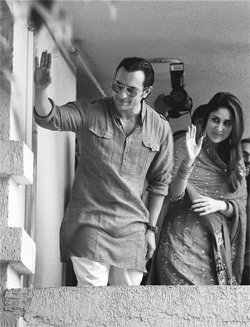 Bollywood actors Saif Ali Khan and Kareena Kapoor greet their fans after getting married in Mumbai on Tuesday.