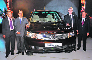 Tata Motors president (passenger car business unit) Ranjit Yadav (L), VP (commercial) Neeraj Garg and MD Karl Slym (R) at the launch of the Safari Storme in Gurgaon on Wednesday.