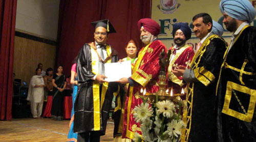 Vice-chancellor Dr SS Gill and principal secretary, Health, Anjali Bhawra award a degree to a student at the first convocation of Baba Farid University of Health Sciences, Faridkot, on Wednesday. 200 medical students received their degrees. 
