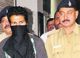 Accused Gaurav Kumar in the police custody at the Sector 11 police station in Chandigarh on Wednesday.