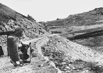 An army trooper keeps a lonely vigil along the Himalayan frontier