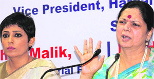 The Chief Ministers wife, Asha Hooda (right), makes a point at a seminar on female foeticide and atrocities against women in Chandigarh on Wednesday. Actor Meghna Malik is also seen in the picture. 