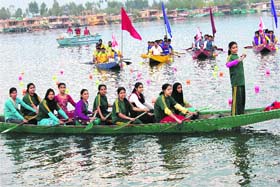 A group of girls takes part in the Jashn-e-Dal festival on the Dal Lake in Srinagar on Wednesday
