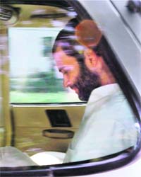 Congress general secretary Rahul Gandhi leaves after meeting PM Manmohan Singh in New Delhi