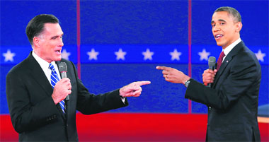 US Republican presidential nominee Mitt Romney (L) and President Barack Obama gesture during the second debate in New York.