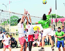 Players in action during the CBSE Cluster XVI Volleyball Tournament being played at Sri Guru Harkrishan Senior Secondary Public School in Amritsar on Thursday