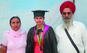 Ramanjit Kaur flanked by her parents.