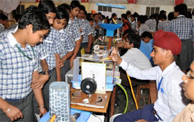 Children watch the models on display at the science exhibition that began at the MSD School in Bathinda on Thursday.