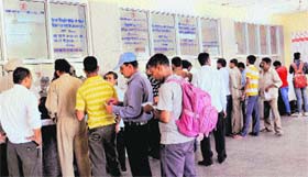 People queue up for reservation at counters at the Chandigarh railway station