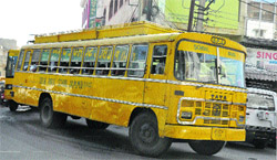 An old bus ferries schoolchildren in Jammu. 