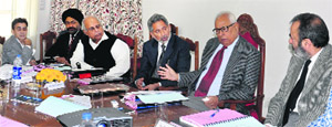 Governor NN Vohra (second from right) chairs the 73rd meeting of the Jammu University Council at the Raj Bhawan. 