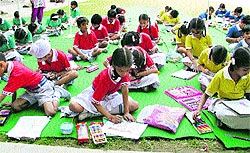 Students take part in a painting competition at HVM Convent School in Ludhiana on Thursday