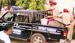The accused being produced in a court in Faridkot on Thursday