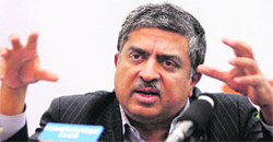 UIDAI chairman Nandan Nilekani addressing a press conference in New Delhi on Friday. 