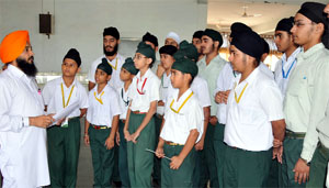 Students of St Xaviers prepare for the turban-tying contest on Friday. 