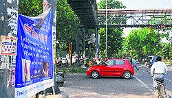 A banner hangs on a bridge at Phase VII