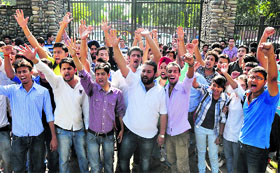 Engineering students hold protest in Jammu on Friday.