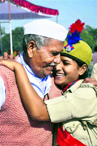A woman police constable embraces her father after a passing out parade at the Police Training Academy in Moradabad on Friday