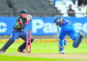 Sachin Tendulkar of Mumbai Indians is run out by Dan Hodgson of Yorkshire during their rain-hit match in Cape Town on Thursday night. 