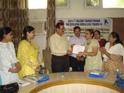 Bathinda civil surgeon Dr Ajay Sahni presents certificate to a participant at the seminar on Saturday. 