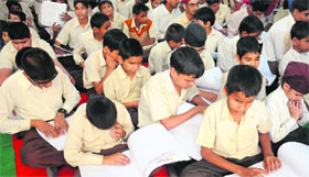 Students of Institute for Blind, Sector 26, with the Braille newspapers on Saturday.