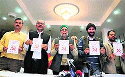 Sanjay Chauhan, Kuldeep Tanwar, Onkar Shaad, Tikender Panwar and Vijendra Mehra release the manifesto in Shimla on Saturday