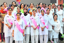 Students of Government College for Women during the investiture ceremony in Jammu on Saturday. 