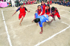 A kho-kho match in progress at Guru Nanak Stadium in Ludhiana.