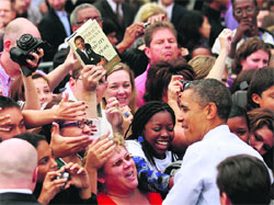 A copy of US President Barack Obamas book The Audacity of Hope is held by a supporter looking for an autograph during a campaign rally in Virginia.  Reuters