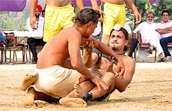 Players slug it out during a kabaddi match in the under-19 category for boys on Sunday