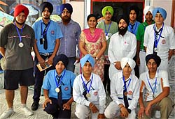 The winners of turban tying contest along with the school principal Dr Satwant Kaur Bhullar